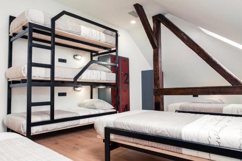 เตียงในห้องที่ Hostel Vila Pohorje