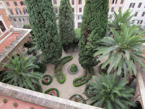 an overhead view of a garden with trees and plants at Casa S. Giuseppe di Cluny in Rome