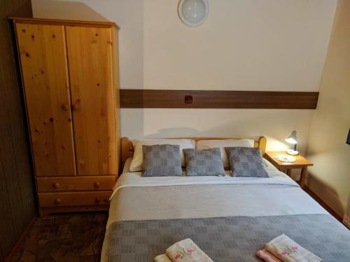 Postel nebo postele na pokoji v ubytování Apartma Kramar Podkoren