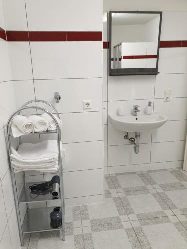 Koupelna v ubytování KM Apartment