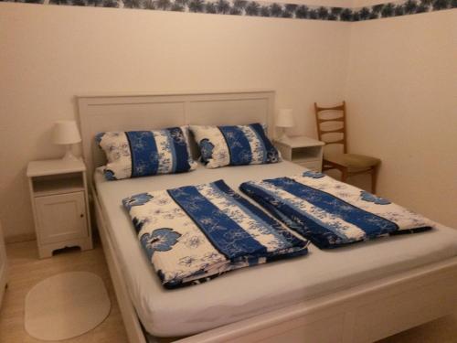 A bed or beds in a room at Appartementanlage Tecklenburger Altstadt