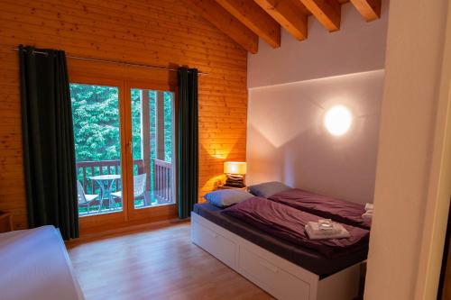 Katil atau katil-katil dalam bilik di Hotel Ristorante LIDO