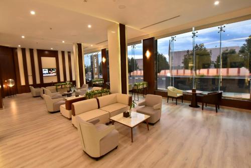 Χώρος καθιστικού στο The District Hotel Najran
