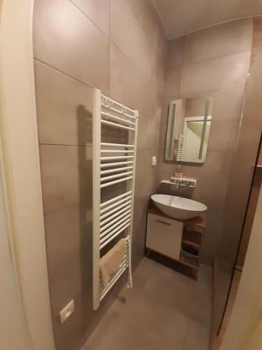 A bathroom at Apartment Klimka with balcony, free wifi and free parking