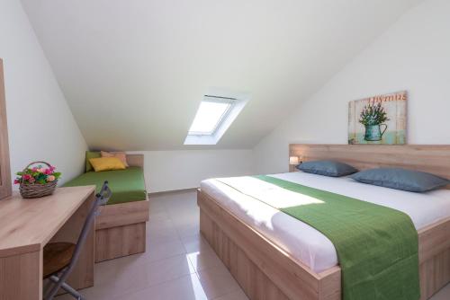 Postel nebo postele na pokoji v ubytování Villa Adriatic Rooms