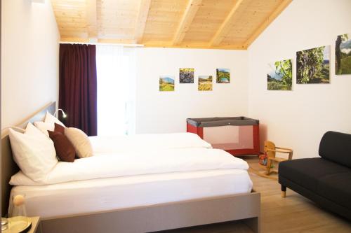Postel nebo postele na pokoji v ubytování 8 Grappoli Agritur