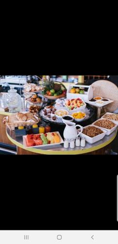 a buffet with many different types of food on a table at Villas for Vacation 32-18-6 in Sosúa