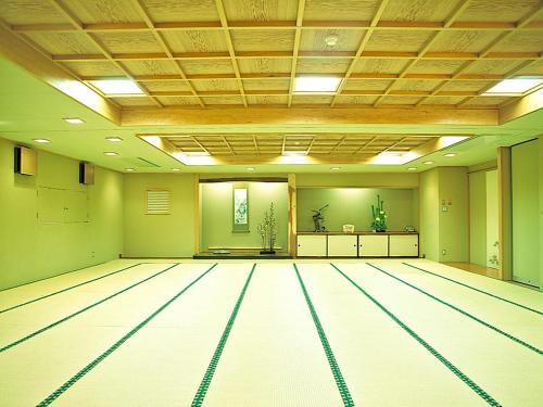 a bowling alley with lanes in a room at Yuzawa Hotel in Yuzawa