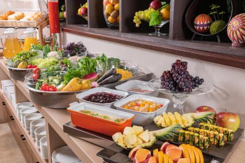 a buffet with many different types of fruits and vegetables at Alpico Plaza Hotel in Matsumoto