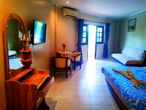 Postel nebo postele na pokoji v ubytování Southern Star Resort