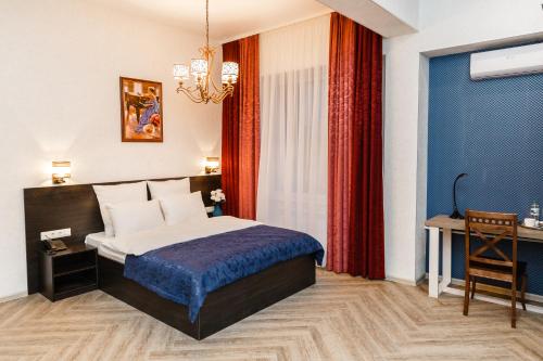 Giường trong phòng chung tại Apart hotel Oblaka