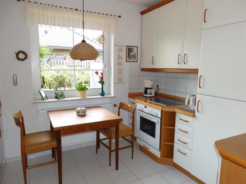 Kuchyň nebo kuchyňský kout v ubytování Ferienwohnung Ruwald