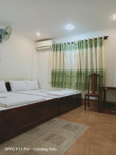 Giường trong phòng chung tại Hung Kiet Guesthouse