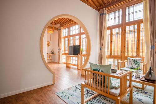 Televisyen dan/atau pusat hiburan di Floral Tengchong Mountain hotel