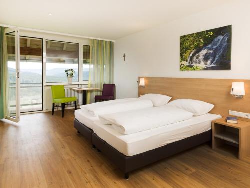 Cama ou camas em um quarto em Haus Feldberg-Falkau