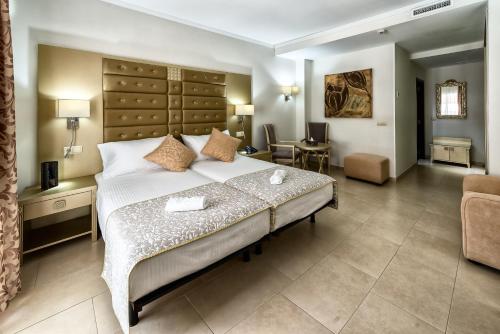 a bedroom with a large bed in a room at Moon Dreams Torremolinos in Torremolinos