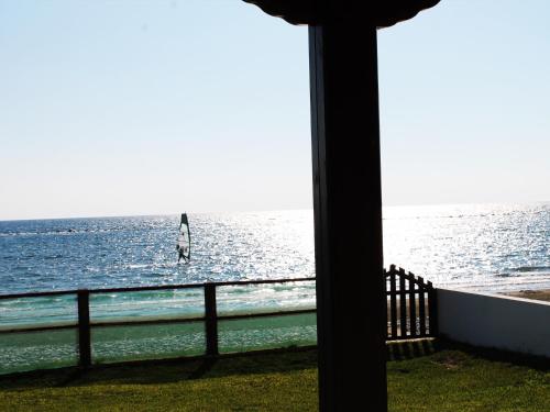 a view of the ocean from a house at Panorama Beach House, 5 meters to the sea in Pervolia
