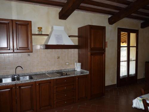 Kuchyň nebo kuchyňský kout v ubytování Residence Il Monastero