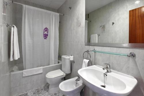 Koupelna v ubytování Europa Family Apartments