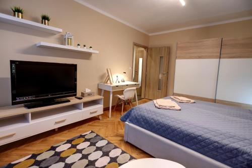 Posteľ alebo postele v izbe v ubytovaní Old Town Apartment