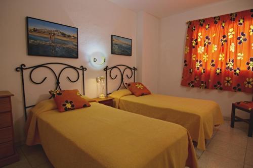 Säng eller sängar i ett rum på Torres del Sol - Los Cristianos