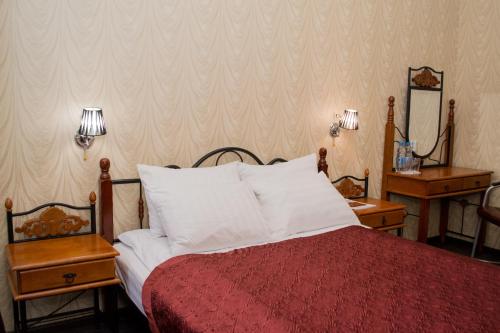 Кровать или кровати в номере Отель Тверская 5