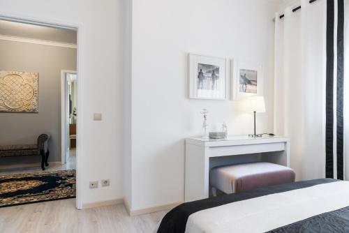 Кровать или кровати в номере Metropolitan Gaia-Porto