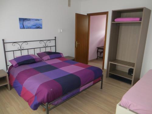 Postel nebo postele na pokoji v ubytování Agriturismo G.GARTROZ