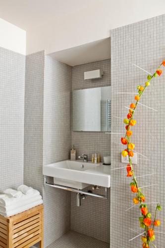 a bathroom with a sink and a mirror at MyNavona in Rome