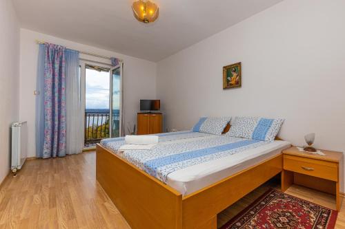 Posteľ alebo postele v izbe v ubytovaní Vacattio apartments
