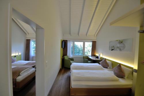 Hotel Sommerau 객실 침대