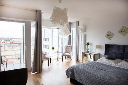 Postel nebo postele na pokoji v ubytování Apartamenty I.M.A Towarowa