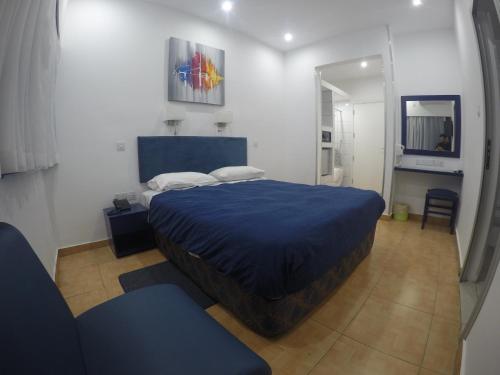Postel nebo postele na pokoji v ubytování Asty Hotel