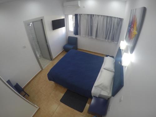Postel nebo postele na pokoji v ubytování Asty Hotel