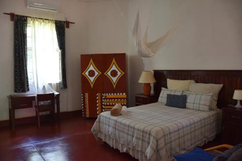 Un pat sau paturi într-o cameră la Tabonina Bis