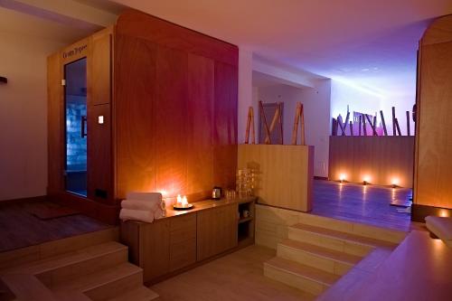 a room with stairs and a stage with lights at TUISuneo La Conchiglia - Adults Only in Capo Vaticano