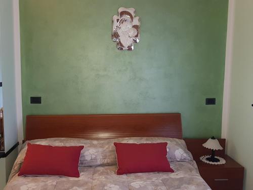 Una cama o camas en una habitación de B&B da Silvana a Talamello