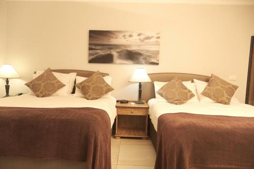 The Point Hotel & Spaにあるベッド