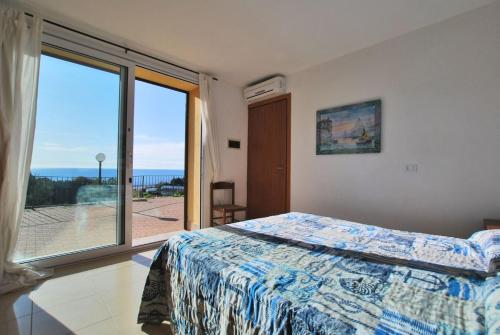 Ένα ή περισσότερα κρεβάτια σε δωμάτιο στο Villa Del Mare Ligure Elvezia