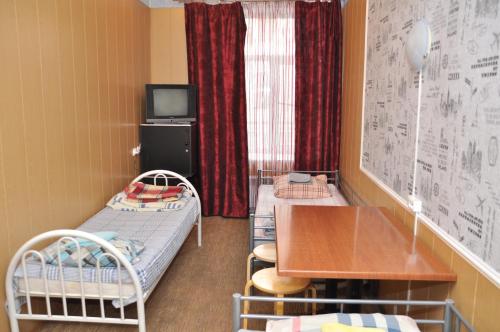 Cama o camas de una habitación en Grechesky-15 Guest house