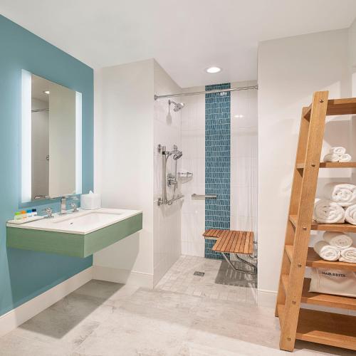 a bathroom with a sink and a shower at Margaritaville Hotel Nashville in Nashville