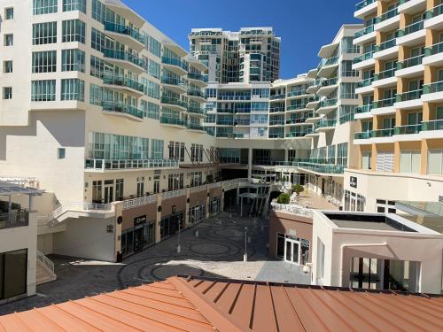 arial view of a building with tall buildings at Costa Bahia Hotel Paseo Caribe in San Juan