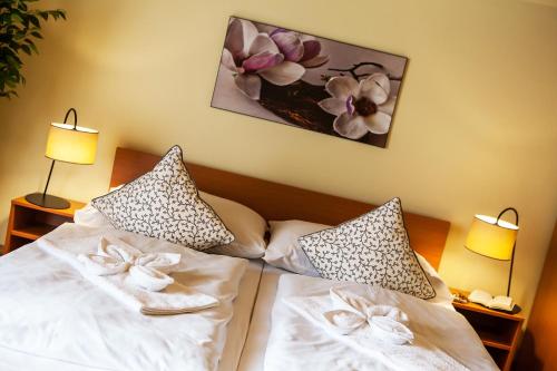Postel nebo postele na pokoji v ubytování Apartmány Pinus, Tále, Chopok Juh