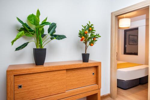 Postel nebo postele na pokoji v ubytování Orbi Palace Hotel Official