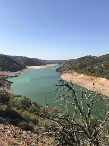 a view of a river in the middle of a valley at Casa Rural Las Jañonas CC-CR-00219 in Gata