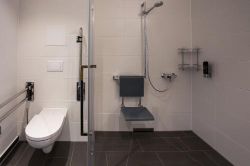 Ett badrum på Premium Apartment München Messe