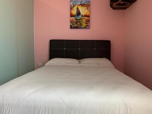 Postel nebo postele na pokoji v ubytování Elmark Hotel Kuantan