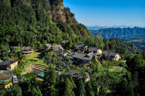 an aerial view of a resort in a mountain at Evergreen Retreat-walk to National Forest Park, free pick up service in Zhangjiajie