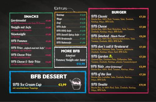a chalkboard menu for a fast food restaurant at Gästehaus am Wasserpark in Rust