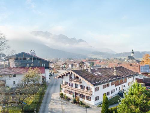a view of a town with mountains in the background at Beim Kreuzfelder Gambskogel in Inzell